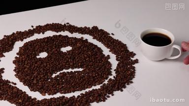 由<strong>咖啡豆</strong>组成的悲伤的表情实拍4k